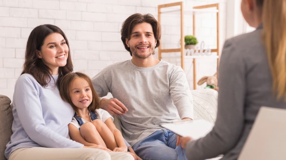 Family in a consultation meeting during relocation service for an international assignment.