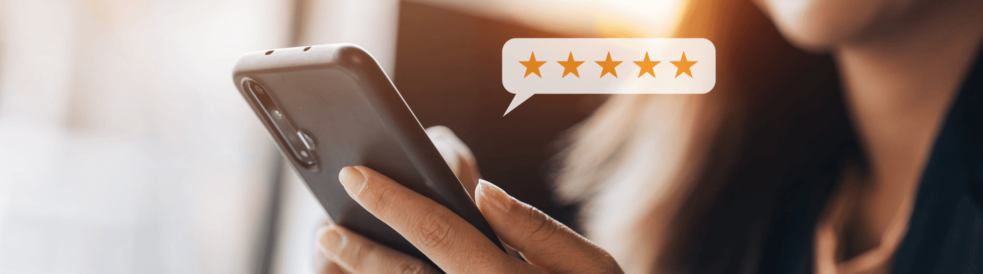 Customer rates business relocation with five stars on smartphone. User-friendly online review for moving company.