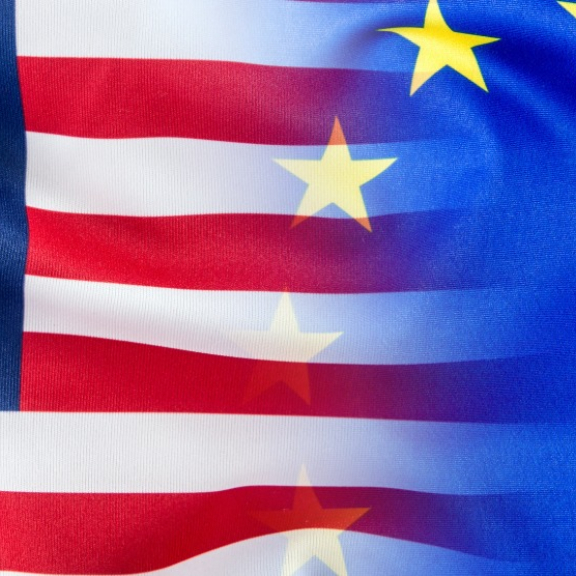 Merged flags of the USA and the European Union, transitioning smoothly into each other.
